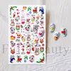 Pegatinas transfronterizas para uñas, con diseños de dibujos animados temáticos de Navidad e invierno, incluyendo a Santa Claus, dinosaurios y renos, con parte trasera adhesiva