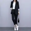 Conjunto de blazer de duas peças com botões e bolso, estilo transfronteiriço, para mulheres, moda primavera e outono, modelagem solta, estiloso e moderno