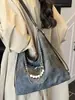 Bolso tote de gran capacidad para mujer, nuevo bolso de hombro de moda de verano 2026, mochila casual para estudiantes universitarios