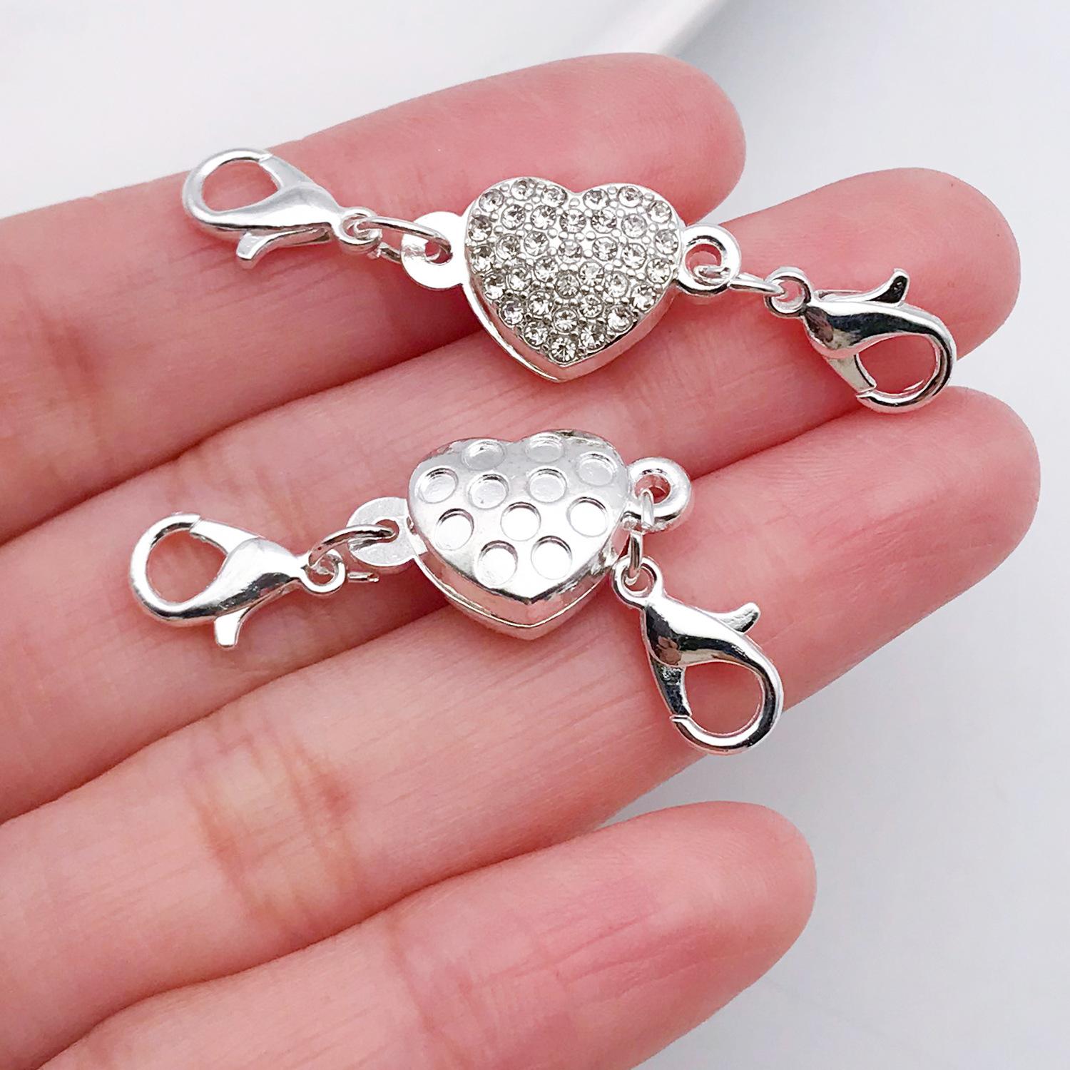 21202-亮银点钻心形成品链接磁铁扣46x11mm-4g。