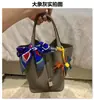 2026 Novo Estilo Bolsa Cesta de Couro Granulado de Primeira Camada, Bolsa de Ombro e Mão Fashion, Bolsa Saco Casual, Venda Direta da Fábrica