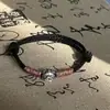 Ins pulsera de león sacudidor estilo Tíbet todo a juego cuerda color vino tinto tejida a mano simple pulsera de la suerte estilo chino