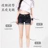 Shorts de mezclilla sexys de cintura baja americanos para mujer 2025 Verano Nuevo Ajustados Enrollados Elásticos Línea A Pantalones cortos Hot de pierna envuelta