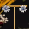 Pendientes de circonita con flores de estilo coreano para mujer, nuevos y modernos, serie con núcleo de flores, accesorios populares, fabricantes de pendientes al por mayor