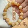 Pulsera de raíz de bodhi de jade blanco degradado explosión de red roja plato de estudiante jugar alrededor del dedo suave pequeño libro rojo texto pulsera de juego al por mayor
