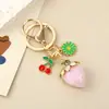 Pendente Criativo Artificial Estéreo Morango Cereja Fofo Pequeno Chaveiro de Liga Metálica Flor Doce Japonês e Coreano Acessórios