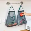 Bolsa colgante para frutas y verduras bolsa de red para almacenamiento de cebolla jengibre ajo bolsa de almacenamiento doméstica hueca transpirable de mano portátil al por mayor