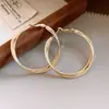 Aretes colgantes redondos de tres capas trenzadas con pasador de plata, aretes simples y elegantes, lujo ligero con un toque de alta gama, diseño único y de nicho
