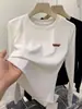 Camiseta de manga larga de algodón puro para mujer, nuevo estilo otoño 2026, adecuada tanto para usar sola como debajo de otras prendas, top básico de canalé ajustado con cuello redondo