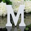 Suministro de fábrica 26 letras 8CM letras inglesas de madera modernas adornos decoración de hogar boda accesorios de fotografía