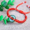 Cuerda roja tejida a mano para el año de vida para mantener la paz hebilla de paz de jade sintético cuerda de mano ajustable roja pulsera de la suerte