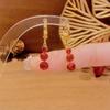 Elegantes Exquisitos Aretes de Borla de Zircón Rojo para Mujer Estilo Étnico de Alta Gama Hebilla de Oreja Nicho Lujo Ligero Oreja Aretes Estilo Occidental