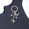 Llavero Colgante Sencillo de Metal Hueco Estrella de Cuatro Puntas Luna para Hombres y Mujeres Colgante Decorativo para Equipaje Regalo