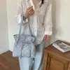 Bolso de hombro de lunares transfronterizo para mujer, nuevo modelo de verano 2026, bolso de hombro de nicho de alta gama, bolsa de mano de gran capacidad