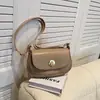 Bolso popular para mujer 2023 nuevo nicho moda todo partido hombro bandolera axila bolso alta calidad retro bolso de sillín