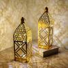 Lámpara de viento de hierro chapado en oro transfronterizo, linterna marroquí hueca, adornos para decoración del hogar, artesanías, candelabros, accesorios de ambiente