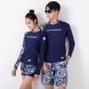 Traje de buceo para mujer nuevo traje de surf dividido de manga larga traje de medusa traje de buceo traje de baño con protección solar en stock al por mayor
