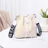 Bolso tipo cubo elegante para mujer, gran capacidad, 2023, nuevo, moderno, personalizado, con cordón, bolso para el día a día, bolso de hombro cruzado moderno y a la moda