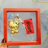 Chaveiro Popular de Desenho Animado Kt Cat Dourado Pingente Criativo para Bolsa Presente para Promoções de Transmissões ao Vivo