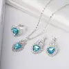 Set europeo y americano de cuatro piezas de diamante nuevo con forma de corazón, pedrería, collar azul claro, pendientes, anillo, set de cuatro piezas, damas, transfronterizo