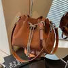 Bolsa Pequeña Transfronteriza Retro Mate para Mujer 2026 Nuevo Estilo Moda Versátil Bolso de Hombro Cruzado Bolso Cubo Súper Popular para el Trabajo