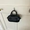 Bolso de mano de moda estilo coreano 2026 principios de otoño nuevo bolso para mujer, alto valor estético, bolso de hombro color block con decoración de cinturón, bolso cruzado