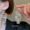 Pendientes Metálicos de Borla con Pétalos Huecos Estilo Europeo y Americano Lujo Ligero Gancho para Oreja de Gama Alta Pendientes de Moda Retro Sentido del Diseño Nicho