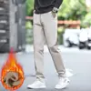 Loja de outlet de comércio exterior calças casuais cropped masculinas primavera-verão para pessoas de baixa estatura, calças retas slim fit ligeiramente afuniladas, calças longas finas, calças masculinas de 9 pontos