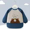 Babero de terciopelo de cristal para bebé, impermeable, antidesgaste, con bolsillo de arroz, para otoño e invierno, delantal para madre y bebé.