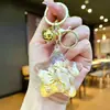 Llavero Creativo Serie Océano Relleno de Aceite Pez Payaso Estrella de Mar Pez Pequeño Colgante de Bolso Decoración de Llavero