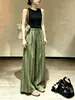 Pantalones casuales ligeros y transpirables de rayas verdes para mujer, nuevo estilo otoño 2026, pantalones largos anchos únicos y súper elegantes y frescos