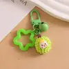Llavero Colgante de Niña Linda de Dibujos Animados Caja Ciega de Transmisión en Vivo Douyin Regalo Set de Auriculares Colgante de Resina Joyería
