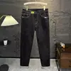 Venta al por mayor transfronteriza Primavera Otoño Jeans para Hombre Nuevo Ajuste Delgado Pierna Pequeña Marca de Tendencia Suaves Elásticos Ropa Casual Resistente al Desgaste Pantalones Largos