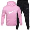 Traje de suéter con capucha y forro polar para hombres y mujeres de Europa y América. Traje de ocio deportivo de moda europea y americana en stock.