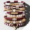Pulsera de Rugby Transfronteriza Europea y Americana de Gran Venta Accesorios de Aleación con Goteo de Aceite Corazón de Cristal Estrella de Cinco Puntas Pulsera Elástica de Amistad
