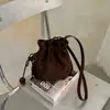 Bolso de cubo grande de moda transfronterizo 2026 estilo vintage, bolso cruzado de diseño nicho estilo coreano, bolso de mano elegante