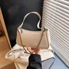 Bolso pequeño transfronterizo estilo retro para mujer, nuevo bolso casual de color liso para otoño 2026, moderno bolso de hombro y cruzado