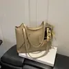 Bolsa de Ombro de Design Nicho Estilo Coreano para Mulheres Nova Moda Primavera 2026 Simples Cor Sólida Suave Bolsa Tote de Axila