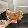 Mochila pequena transversal modelo novo 2026 transfronteiriça, bolsa de ombro sob o braço, bolsa bordada estilo chinês moderna, bolsa pequena de alta qualidade