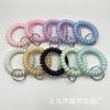 Pulsera de teléfono de línea espiral ancha elástica de plástico directo de fábrica, color gelatina, llavero con anillo de resorte, accesorios para pulsera de mano