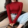 Suéter de cuello alto de manga larga interior de nuevo estilo para otoño e invierno, camisa de capa base, prenda de punto ajustada para estudiantes femeninas, estilo coreano.