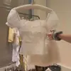 Elegante blusa de retazos de encaje estilo francés con cuello cuadrado y mangas abullonadas para mujer, nuevo modelo de verano, suave y entallada, top deslumbrante