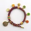 Pulsera tejida a mano estilo Tíbet con Cinco Deidades de la Riqueza, Pulsera Thangka, Colgante Ojo del Dharma del Dios de la Riqueza, Pulsera de Hilo Rojo con Cascabel