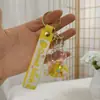 Llavero de Botella de Arena Líquida de Dibujos Animados, Pequeños Regalos para Puestos, Accesorios Acrílicos al por Mayor, Colgante Relleno de Aceite, Rasca Gatos Lindo de Regalo