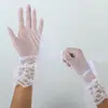 Guantes de encaje para niños transfronterizos, guantes cortos sin dedos, guantes para vestido de decoración de bodas, guantes de encaje de red de pesca para bodas al por mayor