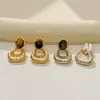 Tendencia de Moda Retro Francesa Pendientes de Aro Sencillos Pendientes Versátiles para el Viaje Diario Pendientes Elegantes de Nicho Pendientes de Botón de Lujo Ligero
