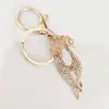Llavero de Gato Ópalo Oxidado Diamante Creativo Elegante Lindo Gato Personalidad Colgante de Bolsa Ópalo