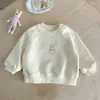 Sudadera de Conejo para Bebés y Niños Pequeños 2026 Primavera Nuevo Estilo Dibujos Animados Pulóver para Niñas Estilo Coreano Versátil Superior Clase A