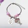 Europa y Estados Unidos pulsera cruzada nueva de acero inoxidable ajustable cadena de cuentas rosas flor letras grabadas a láser joyería al por mayor