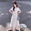 Verano 2026 Nuevo Dulce Floral Manga Corta Moda Femenina Estilo Suave Ribete de Encaje Falda Pastel Conjunto de Dos Piezas